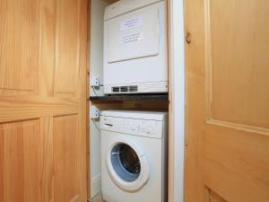 a washer and dryer in a small room at Ferry View in Dartmouth