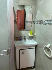 Ett badrum på CasaHogar Apartamento