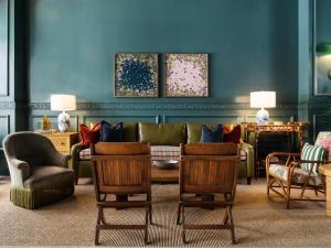 a living room with a couch and chairs at Palihotel San Diego in San Diego