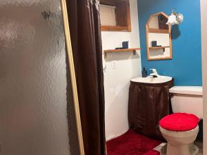 a bathroom with a toilet and a sink at Garden Suite 30 Mins to NYC, Mins to EWR, Prudential Center, NJPACK in Belleville