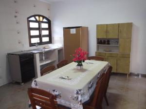 Kuchyň nebo kuchyňský kout v ubytování Vênus Apartamentos