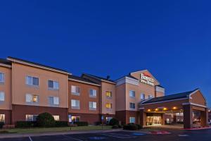 a rendering of a hotel at dusk at Fairfield Inn & Suites by Marriott Rogers in Rogers