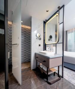 Vannituba majutusasutuses Shenzhen Shanghai Hotel