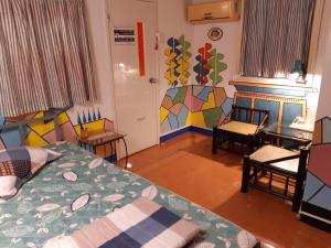 Giường trong phòng chung tại Tonkin Homestay