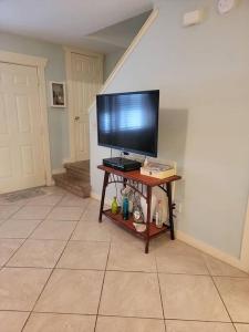 a television sitting on a table in a room at 188WSD in Panama City Beach