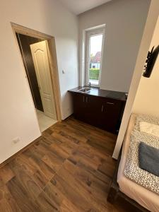 Postel nebo postele na pokoji v ubytování Beregi Apartman