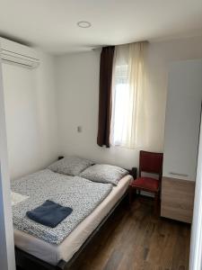 Postel nebo postele na pokoji v ubytování Beregi Apartman