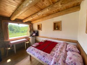 A bed or beds in a room at Tara Place - Camp Rabrenovic