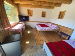 A bed or beds in a room at Tara Place - Camp Rabrenovic