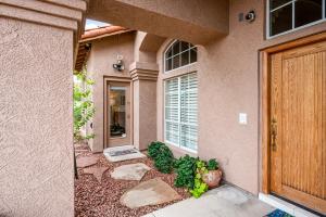 a front door of a house with plants in front of it at Cozy Casita in Scottsdale