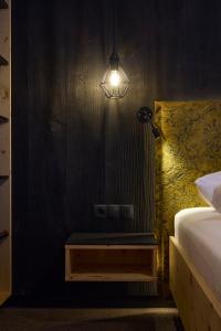 Łóżko lub łóżka w pokoju w obiekcie Hotel Zontaja Superior