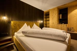 Łóżko lub łóżka w pokoju w obiekcie Hotel Zontaja Superior