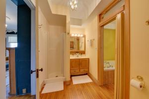 a bathroom with a shower and a sink and a mirror at Lake Michigan Vacation Rental with Private Beach! in Racine +31 photos