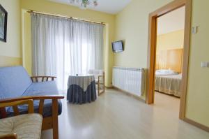 Postel nebo postele na pokoji v ubytování Hotel Isasa