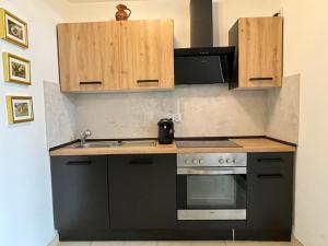 Kuchyň nebo kuchyňský kout v ubytování Wunderschönes Apartment in der Goldstadt Pforzheim