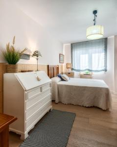 Кровать или кровати в номере Habitación Superior Granada -centro