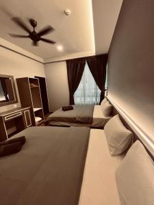 A bed or beds in a room at LAVIE HOTEL & APARTMENT