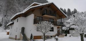 Alpenherz Apartments v zime