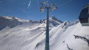 Alpenherz Apartments v zime