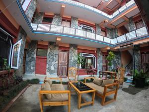 Uma varanda ou terraço em Dharma Backpackers