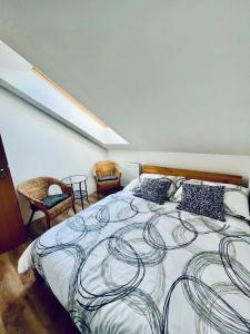 Postel nebo postele na pokoji v ubytování Apartmány v ráji (Českém)