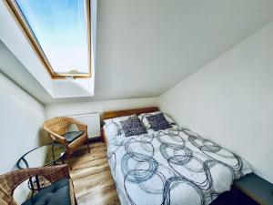 Voodi või voodid majutusasutuse Apartmány v ráji (Českém) toas