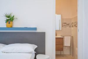 Postel nebo postele na pokoji v ubytování Casa Danieli