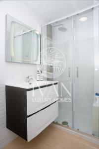 Kúpeľňa v ubytovaní Casa Nala Ivan Luxury Homes 6ªPlta Norte 1ªLinea