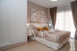 Posteľ alebo postele v izbe v ubytovaní Casa Nala Ivan Luxury Homes 6ªPlta Norte 1ªLinea