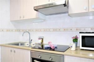 Kuchnia lub aneks kuchenny w obiekcie 56C Vora vistas al mar parking y wifi