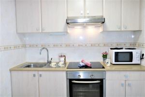 Kuchnia lub aneks kuchenny w obiekcie 56C Vora vistas al mar parking y wifi