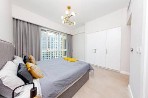 Postel nebo postele na pokoji v ubytování Beautiful upgraded 2BR with Sea view - Palm Jumeirah