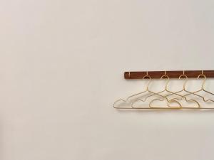 a pair of metal hangers hanging on a wall at 永安101 Wing on x 附陽台 in Taitung City