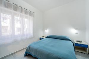 Postel nebo postele na pokoji v ubytování B&B il Rifugio