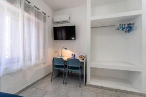 TV a/nebo společenská místnost v ubytování B&B il Rifugio