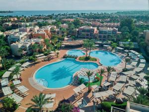 an aerial view of a pool at a resort at Jaz Makadi Saraya Resort in Hurghada