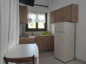 Kuchnia lub aneks kuchenny w obiekcie Para Thin Alos Inn