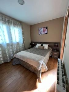Posteľ alebo postele v izbe v ubytovaní Las Catedrales-Casa Canteiro 2 + 10 fotografií