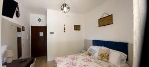Posteľ alebo postele v izbe v ubytovaní Bellavista Rooms