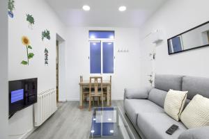 Telewizja i/lub zestaw kina domowego w obiekcie Atocha Station - Apartamento de 2 dormitorios