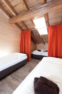 Ένα ή περισσότερα κρεβάτια σε δωμάτιο στο Rutsche Hostel