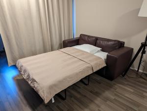 Postel nebo postele na pokoji v ubytování Wonderful and spacious city center apartment - own carpark