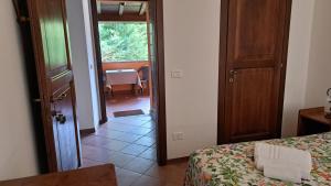 Postel nebo postele na pokoji v ubytování Antico Borghetto - Casa Vacanze