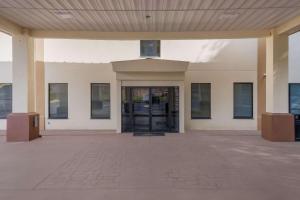 an empty building with a door in the middle at Quality Inn Jefferson at I-85 in Jefferson