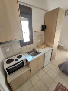 A kitchen or kitchenette at Angelo Studios