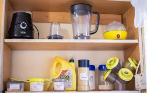 a cupboard filled with lots of kitchen items at 1 BR, TreasureTree Homes, Thika in Thika