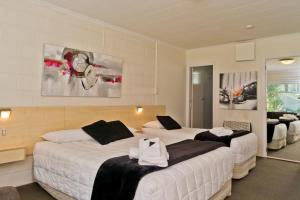 Postelja oz. postelje v sobi nastanitve Picton Accommodation Gateway Motel