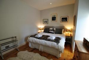 מיטה או מיטות בחדר ב-2 Melville Terrace Anstruther