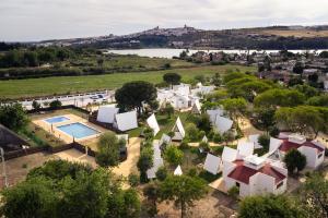 an aerial view of a villa with a swimming pool at Kampaoh Lago de Arcos in Arcos de la Frontera
