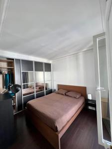 Posteľ alebo postele v izbe v ubytovaní Superbe 2 Chambres Proche Montmartre